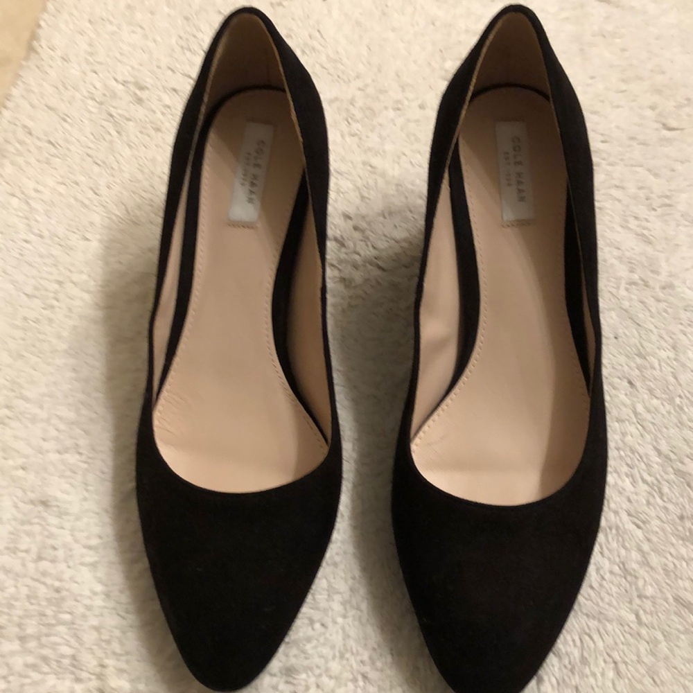 Black suede pumps